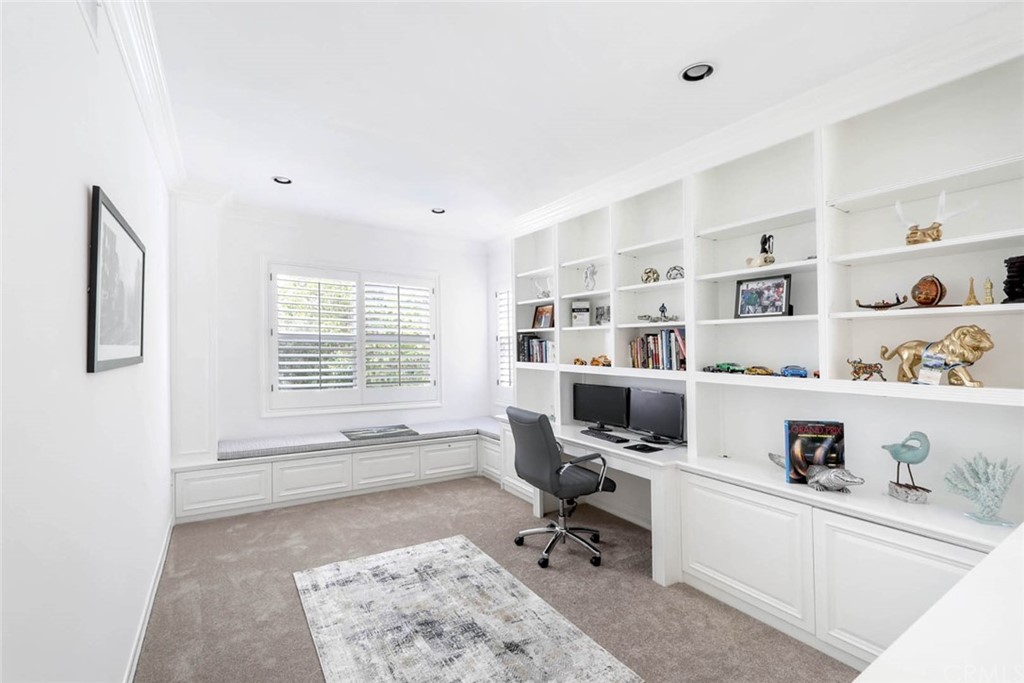 39 Whitehall Newport Beach, CA 92660 - Photo 16 of 35 a living room with furniture cabinets and window