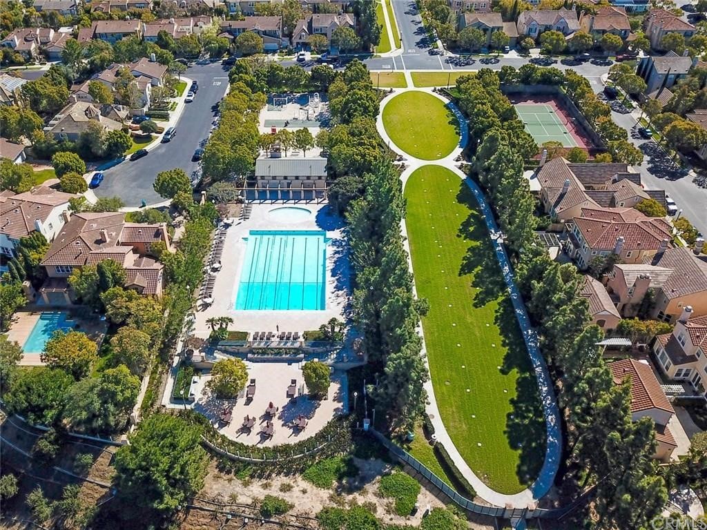 39 Whitehall Newport Beach, CA 92660 - Photo 28 of 35 an aerial view of a swimming pool a yard and mountain view in back