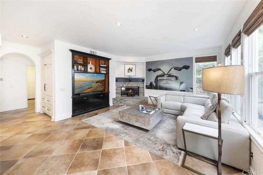 39 Whitehall Newport Beach, CA 92660 - Photo 5 of 35 a living room with furniture and a flat screen tv
