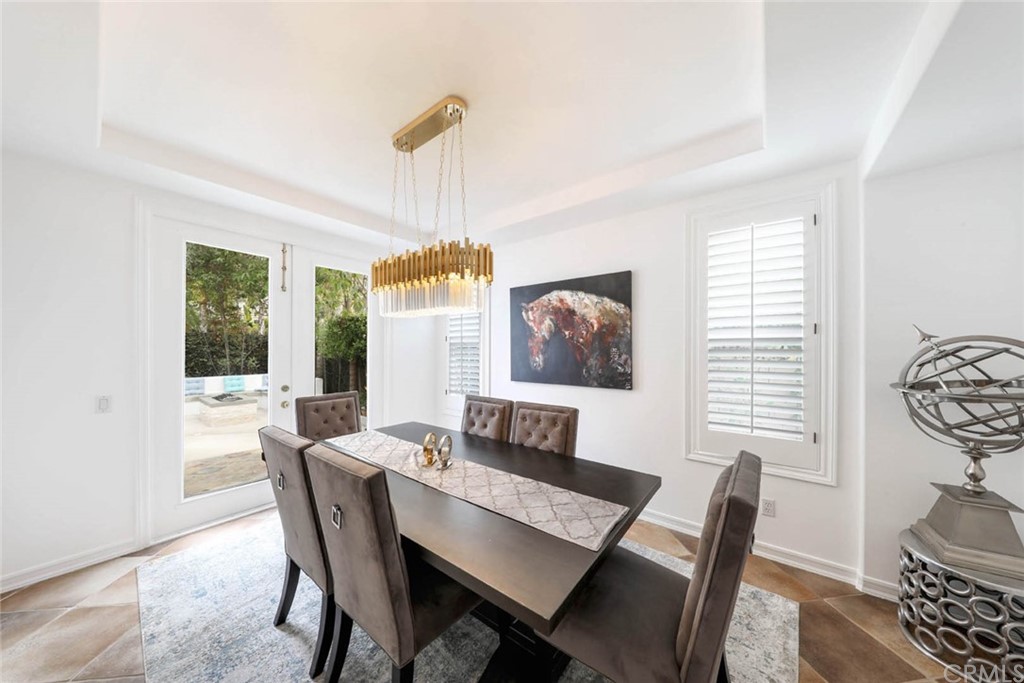39 Whitehall Newport Beach, CA 92660 - Photo 7 of 35 a dining room with furniture and window