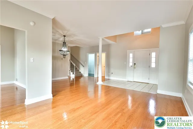 a kitchen with stainless steel appliances granite countertop a sink and a stove top oven