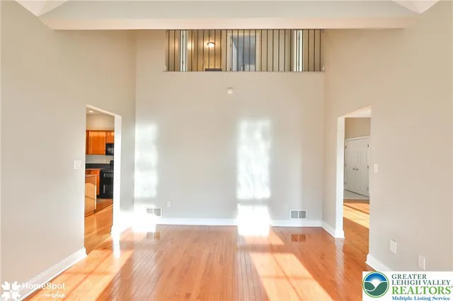 a bathroom with a toilet sink and a mirror