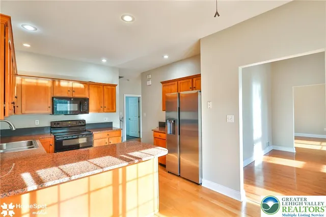 a view of a hallway with a hallway and a room