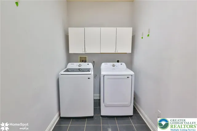 a bathroom with a toilet a sink and a shower