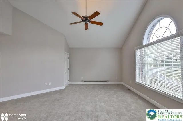 a living room with furniture and a view of living room