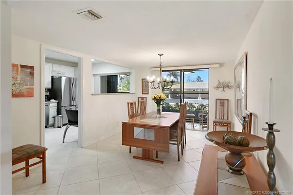 a view of a livingroom with furniture and window