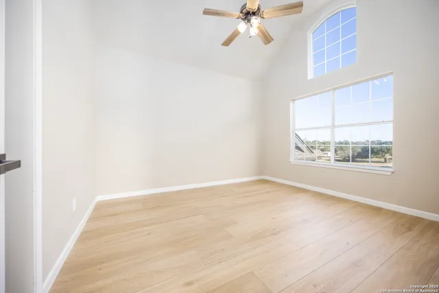 a view of an empty room and window