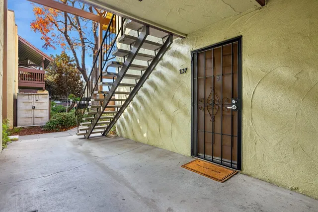 an empty room with staircase