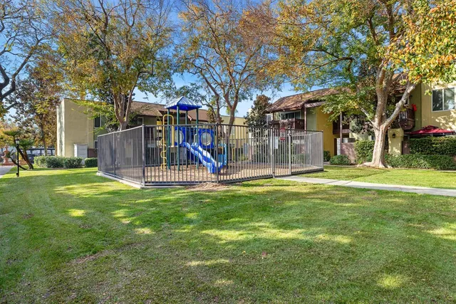 a view of a park with a slide