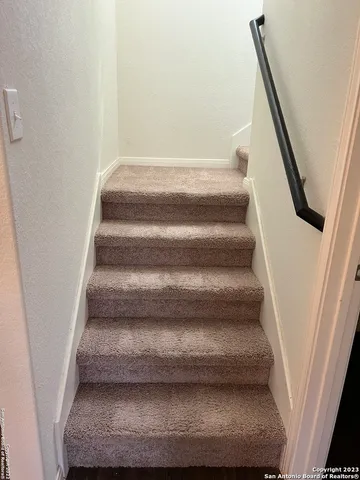a bathroom with a toilet and a sink