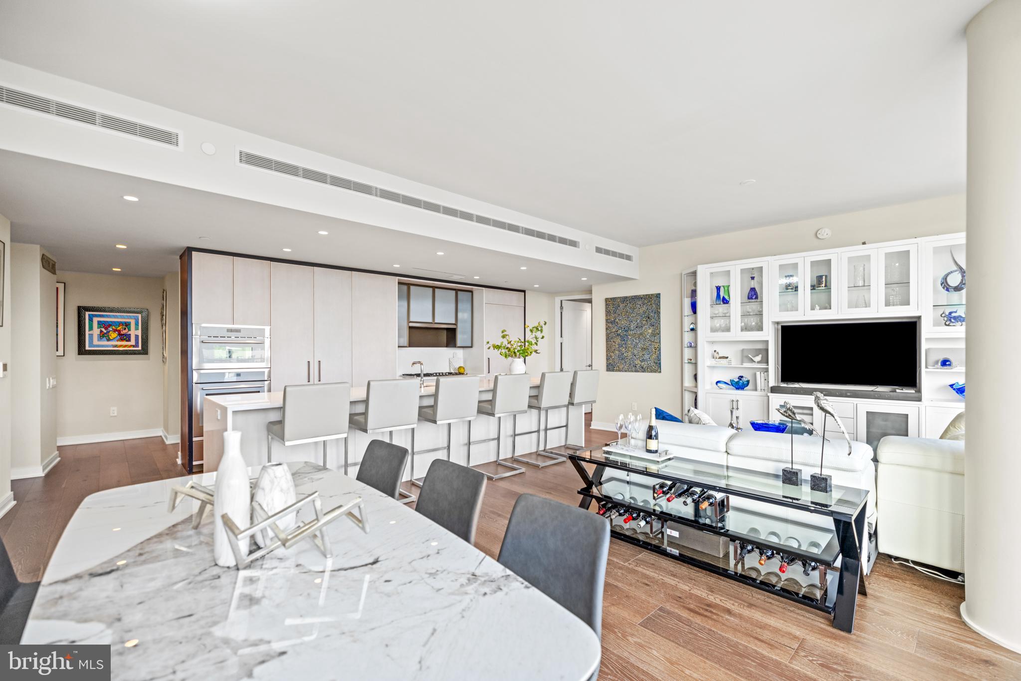 601 Wharf Street Southwest, Unit 602 Washington, DC 20024 - Photo 12 of 104 a living room with furniture and a flat screen tv
