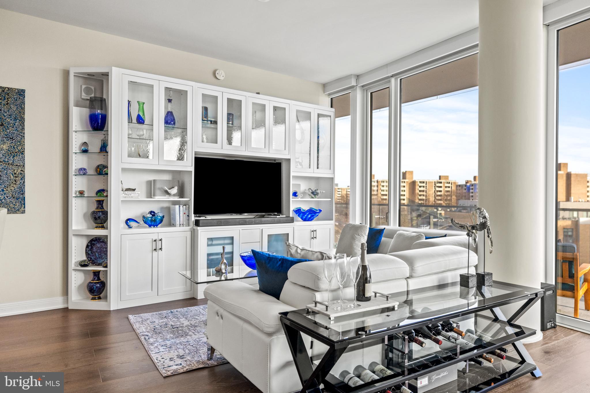 601 Wharf Street Southwest, Unit 602 Washington, DC 20024 - Photo 19 of 104 a living room with furniture and a flat screen tv