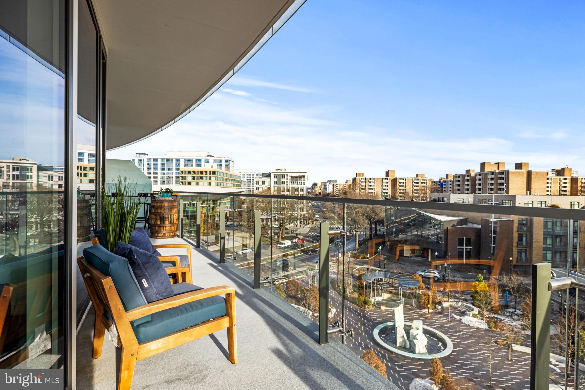 601 Wharf Street Southwest, Unit 602 Washington, DC 20024 - Photo 26 of 104 a view of a balcony with two chairs and a table