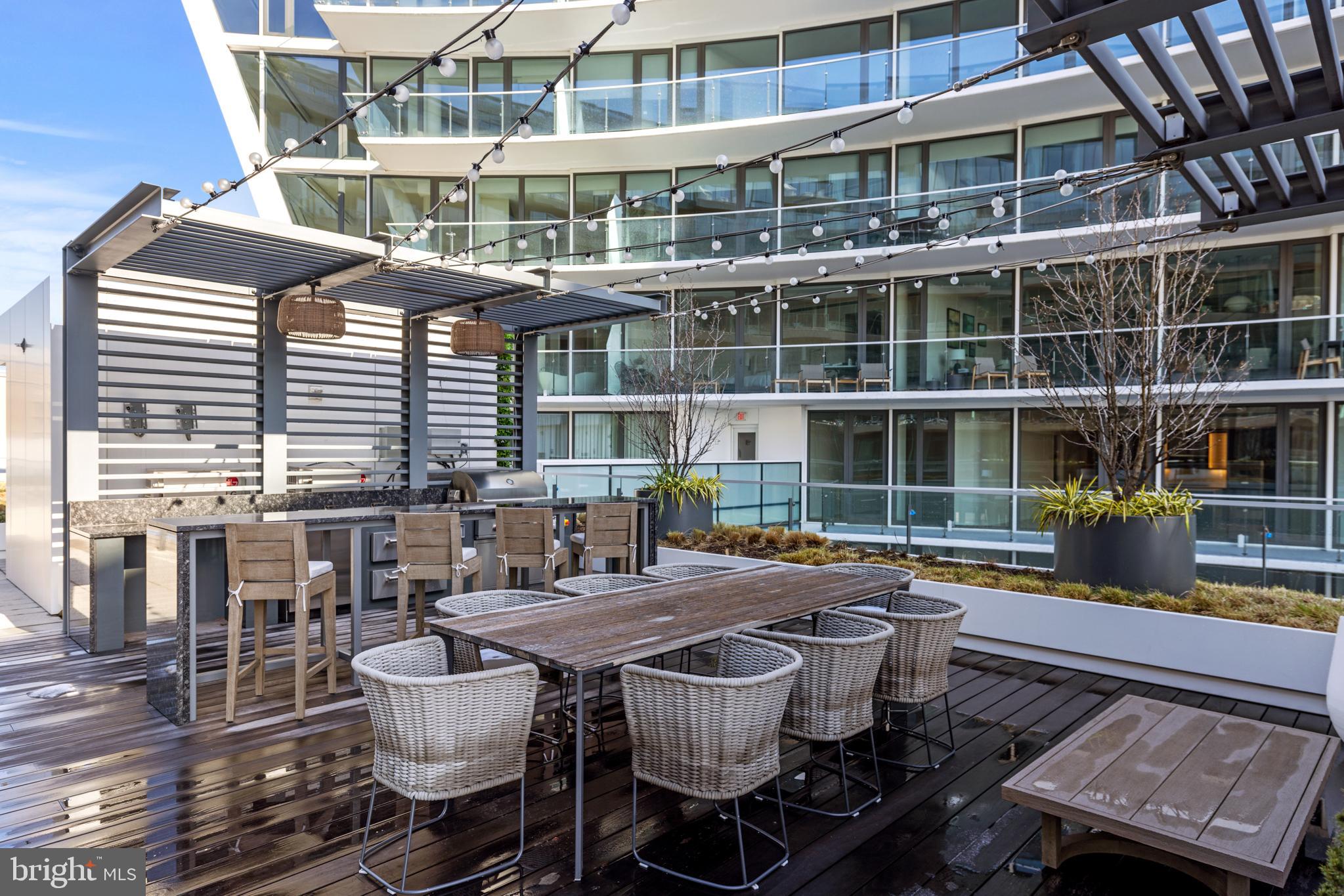 601 Wharf Street Southwest, Unit 602 Washington, DC 20024 - Photo 47 of 104 a building outdoor space with patio furniture