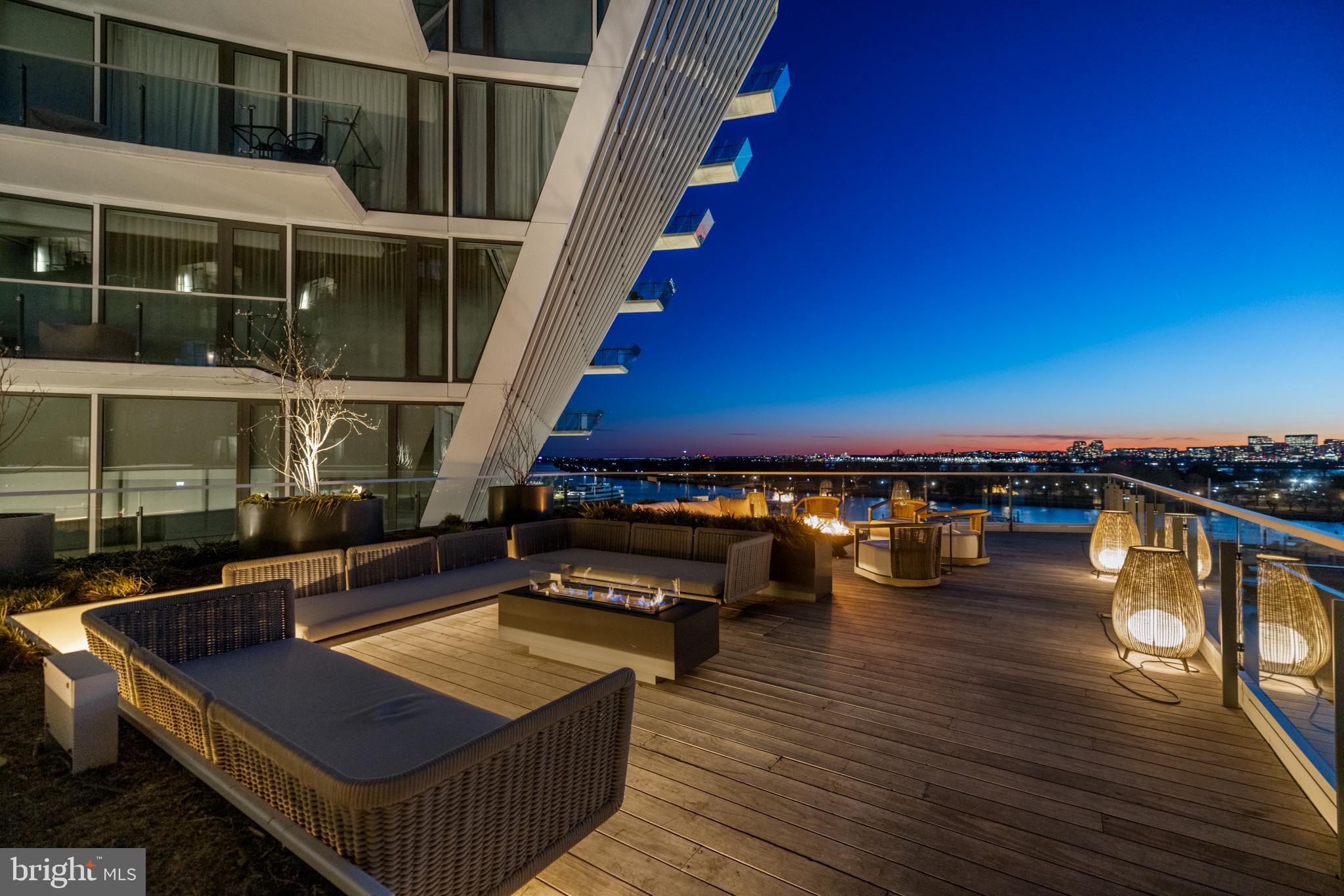 601 Wharf Street Southwest, Unit 602 Washington, DC 20024 - Photo 86 of 104 a view of a balcony with chairs