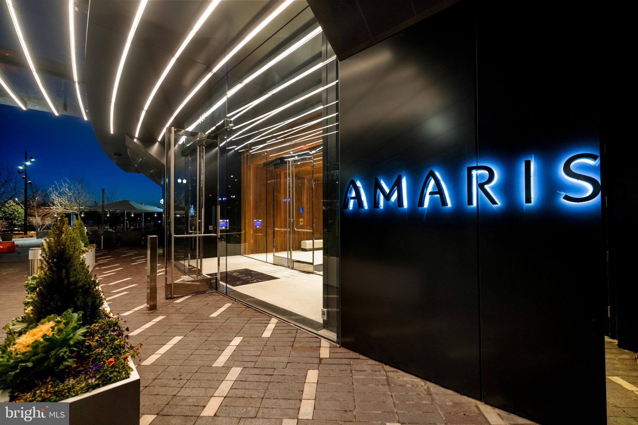 601 Wharf Street Southwest, Unit 602 Washington, DC 20024 - Photo 95 of 104 a view of a porch with a table and chairs under an umbrella