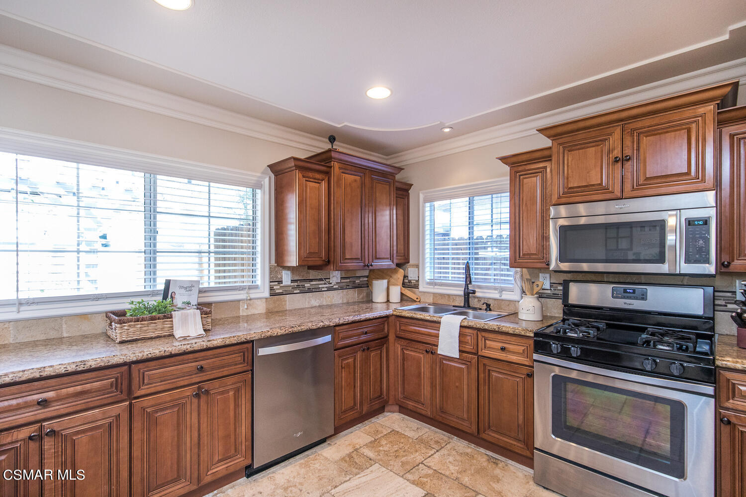 1871 Edgewood Drive Simi Valley, CA 93063 - Photo 11 of 26 a kitchen with stainless steel appliances a stove sink and microwave