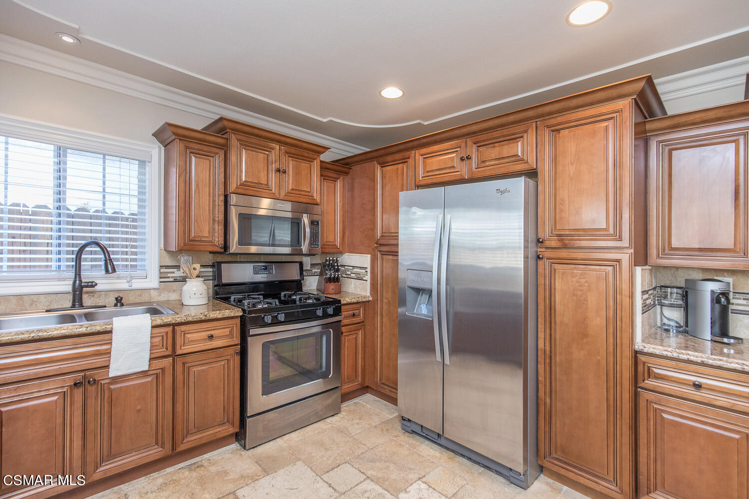 1871 Edgewood Drive Simi Valley, CA 93063 - Photo 14 of 26 a kitchen with stainless steel appliances granite countertop a refrigerator stove and sink