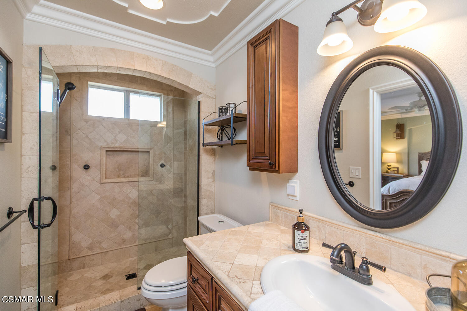 1871 Edgewood Drive Simi Valley, CA 93063 - Photo 19 of 26 a bathroom with a sink a toilet and a mirror