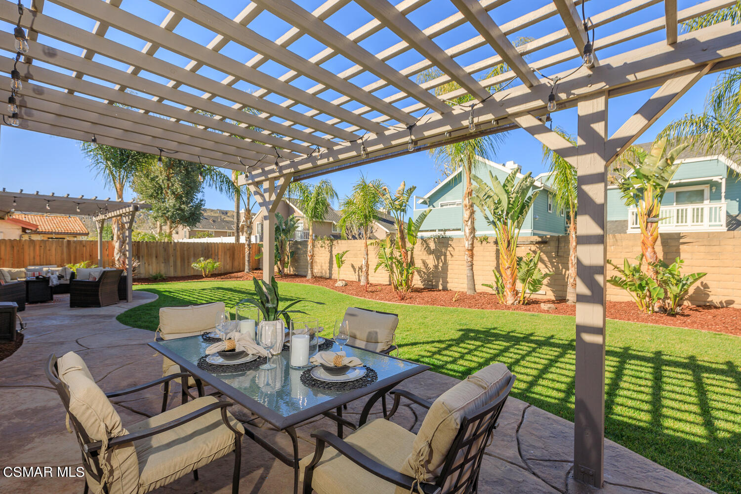 1871 Edgewood Drive Simi Valley, CA 93063 - Photo 23 of 26 a patio with yard glass top table and chairs