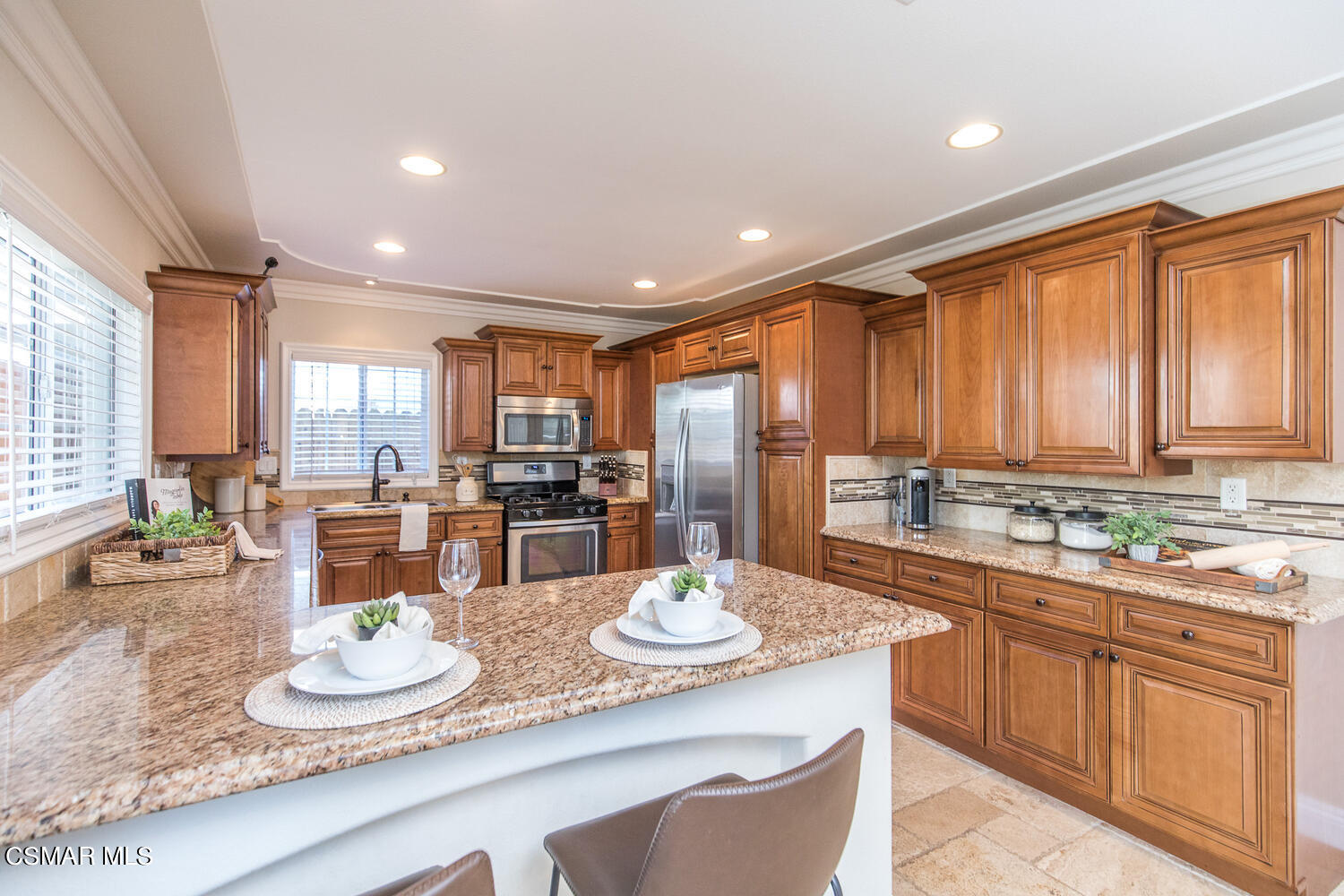 1871 Edgewood Drive Simi Valley, CA 93063 - Photo 10 of 26 a kitchen with a dining table and chairs