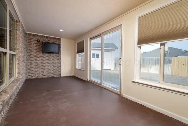 a view of storage and utility room with closet
