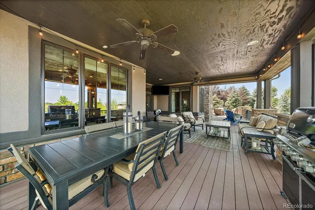 a very nice looking living room with a large window and furniture
