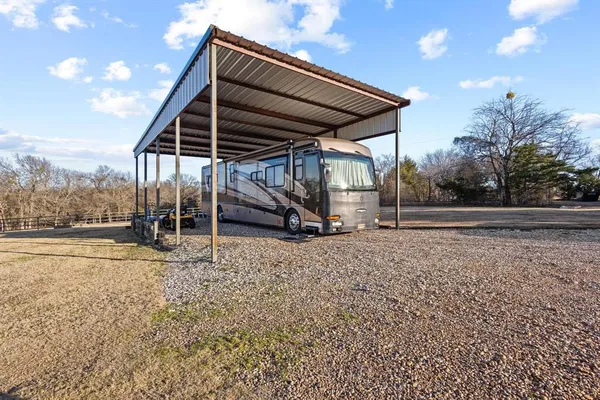 a view of a barn with a yard