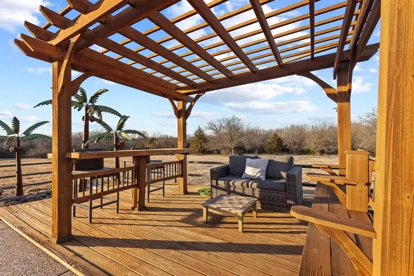 a view of a swimming pool with a lounge chair