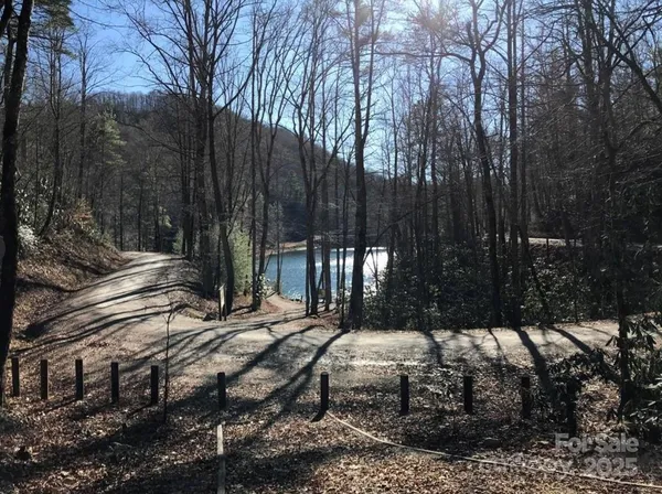 a view of backyard with sitting area