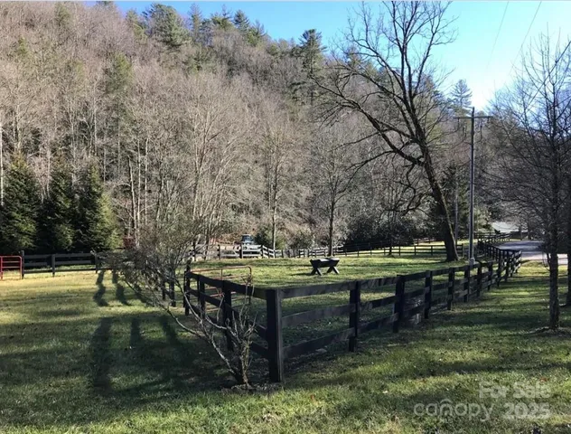 a view of mountain view with trees