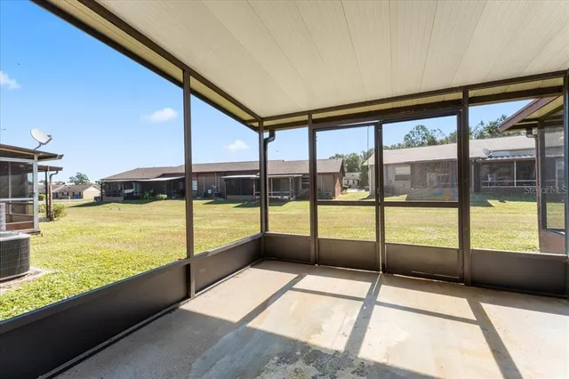 a view of an ocean and trees