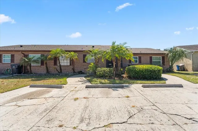 a view of building with garden space