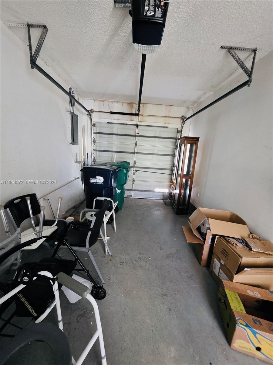 725 Northwest 123rd Avenue Miami, FL 33182 - Photo 16 of 18 a view of a room with gym equipment