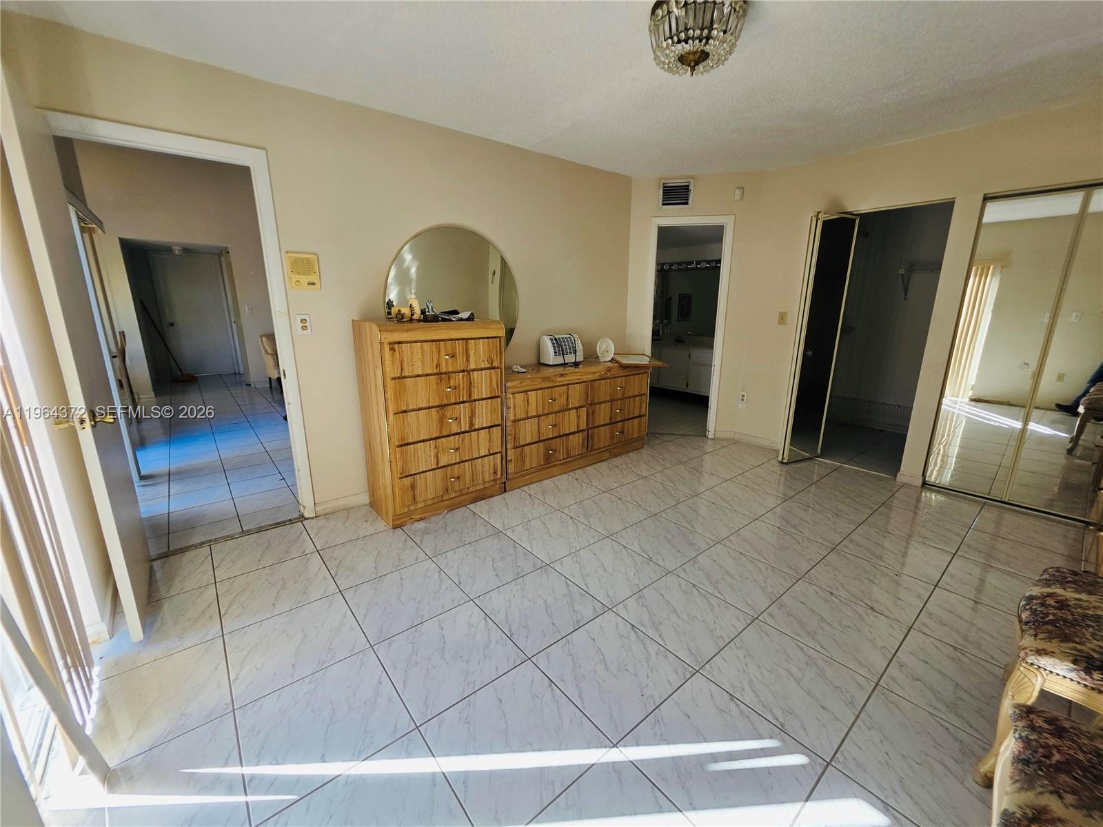 725 Northwest 123rd Avenue Miami, FL 33182 - Photo 5 of 18 a view of a storage & utility room