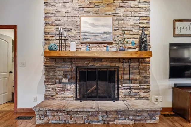 a front view of house with yard and outdoor seating