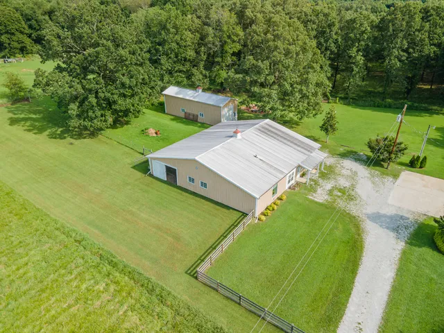 a aerial view of a house with garden