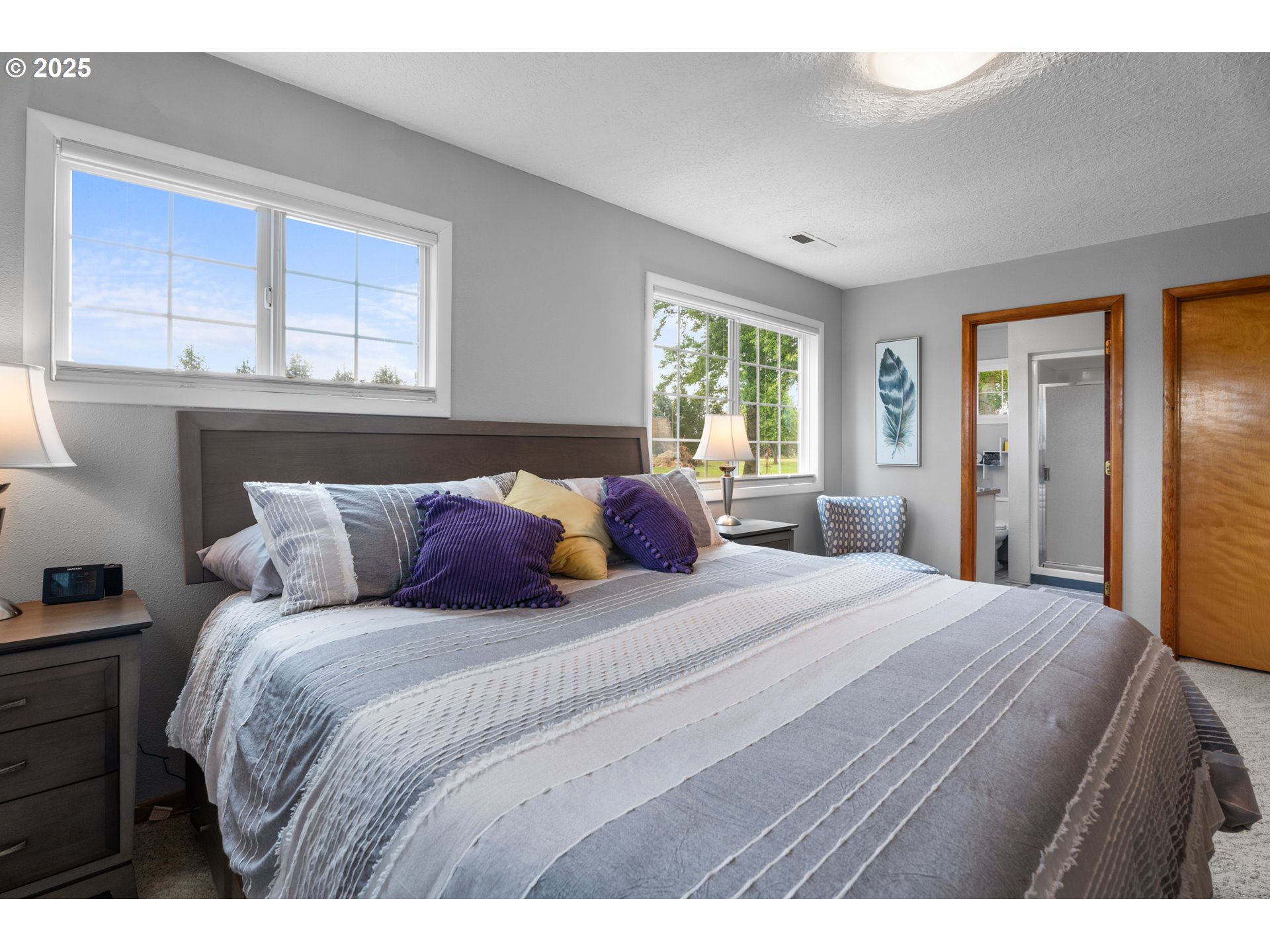 8747 South Heinz Road Canby, OR 97013 - Photo 18 of 48 a bedroom with a large bed and window