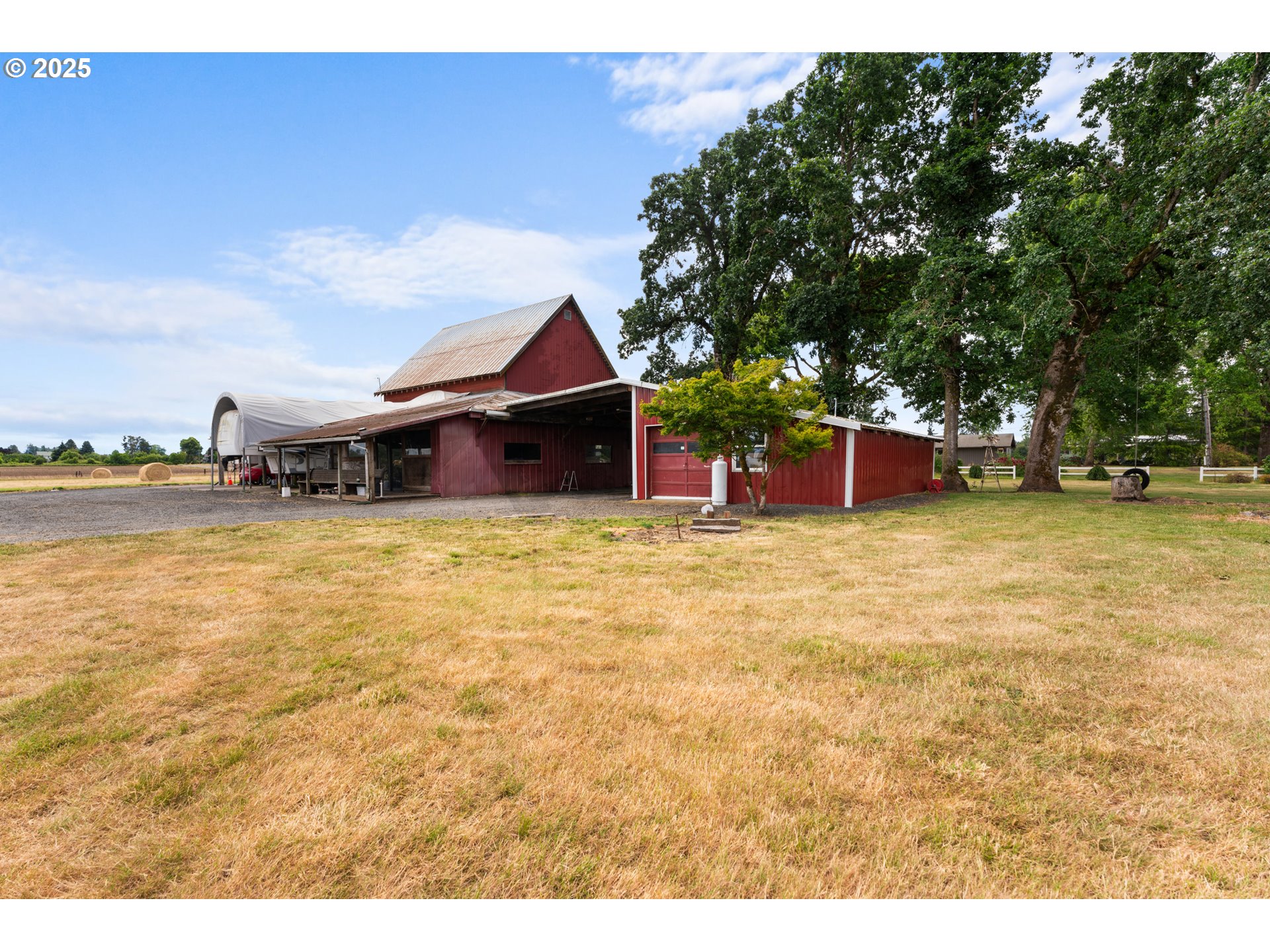 8747 South Heinz Road Canby, OR 97013 - Photo 33 of 48 a view of a house with swimming pool and sitting area