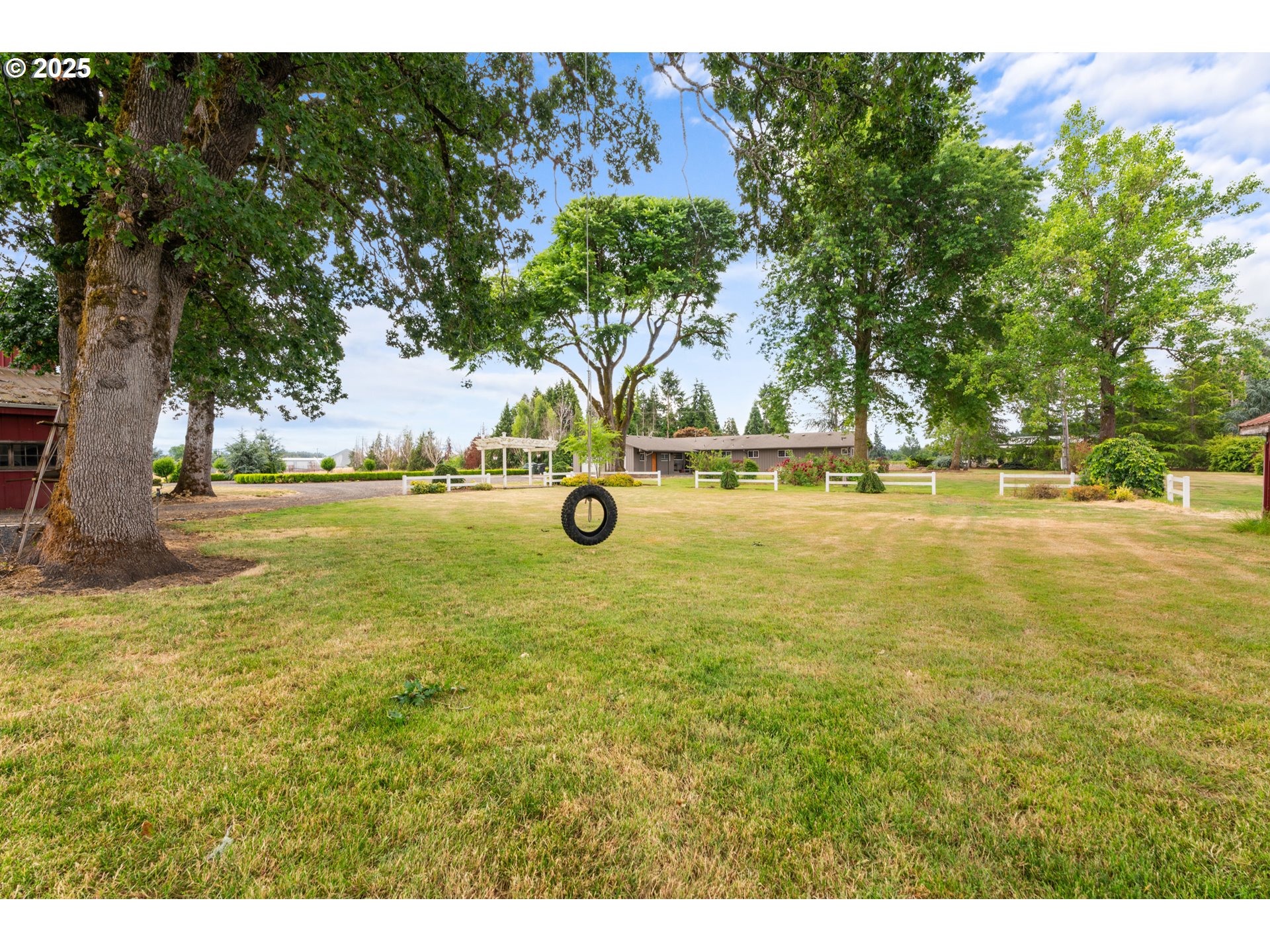 8747 South Heinz Road Canby, OR 97013 - Photo 42 of 48 a view of a yard with an outdoor space
