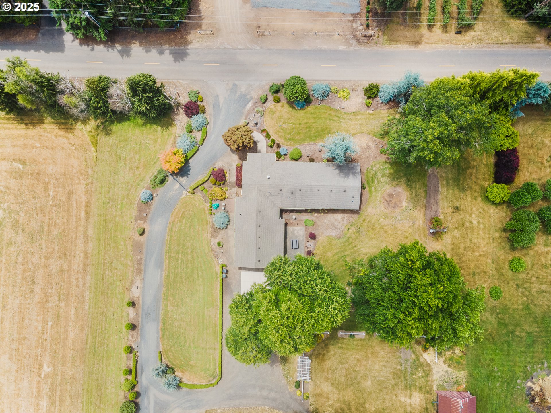 8747 South Heinz Road Canby, OR 97013 - Photo 44 of 48 an aerial view of residential houses with outdoor space and lake view