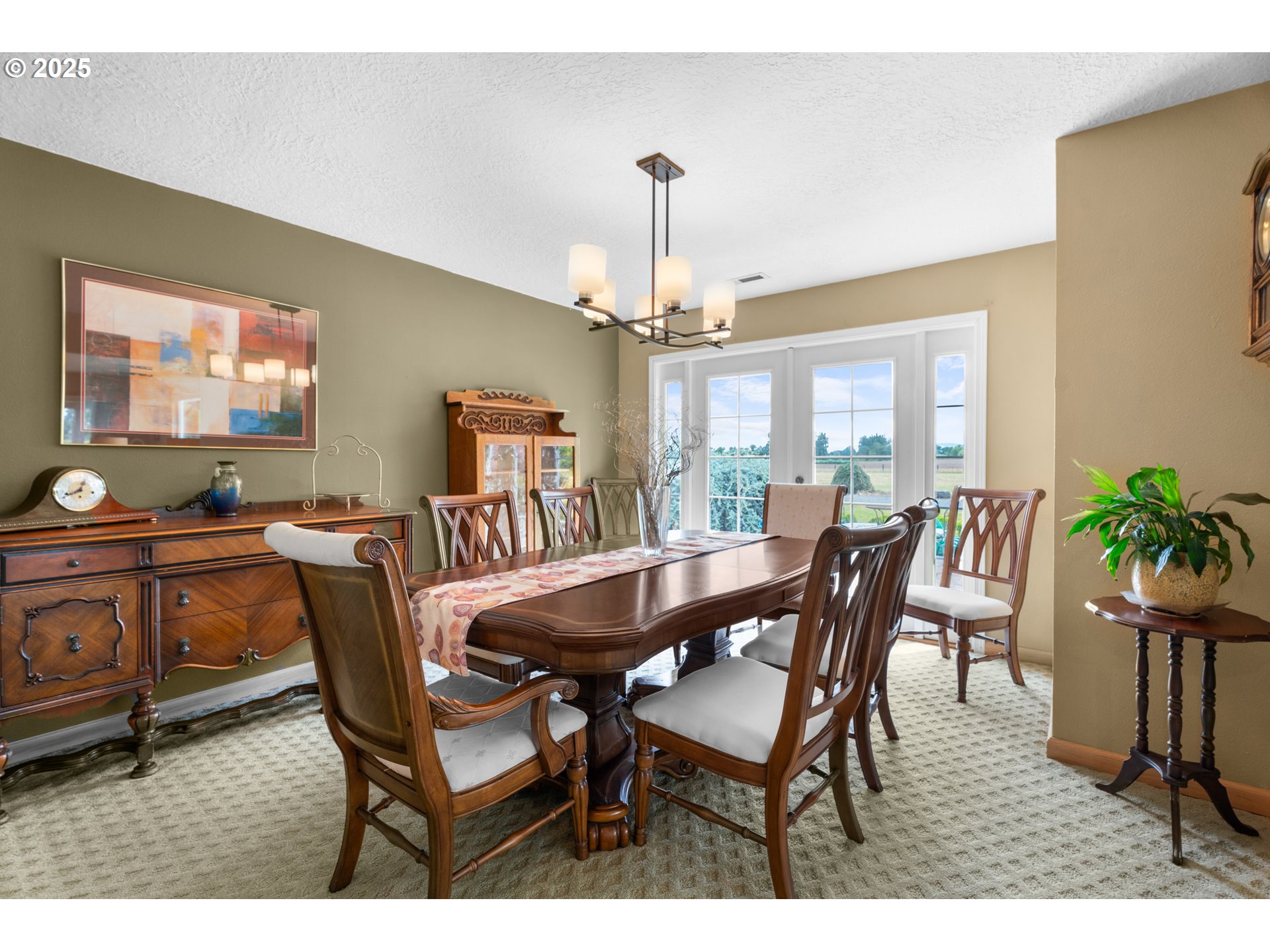 8747 South Heinz Road Canby, OR 97013 - Photo 7 of 48 a dining room with furniture potted plants and wooden floor