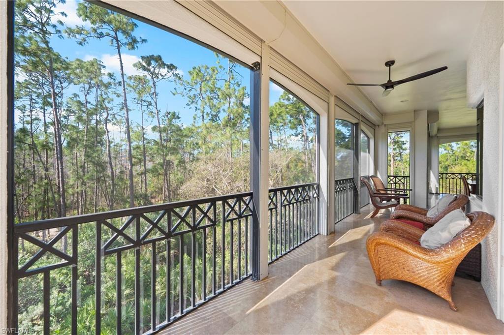 2886 Castillo Court, Unit 103 Naples, FL 34109 - Photo 21 of 38 a balcony with furniture and a potted plant