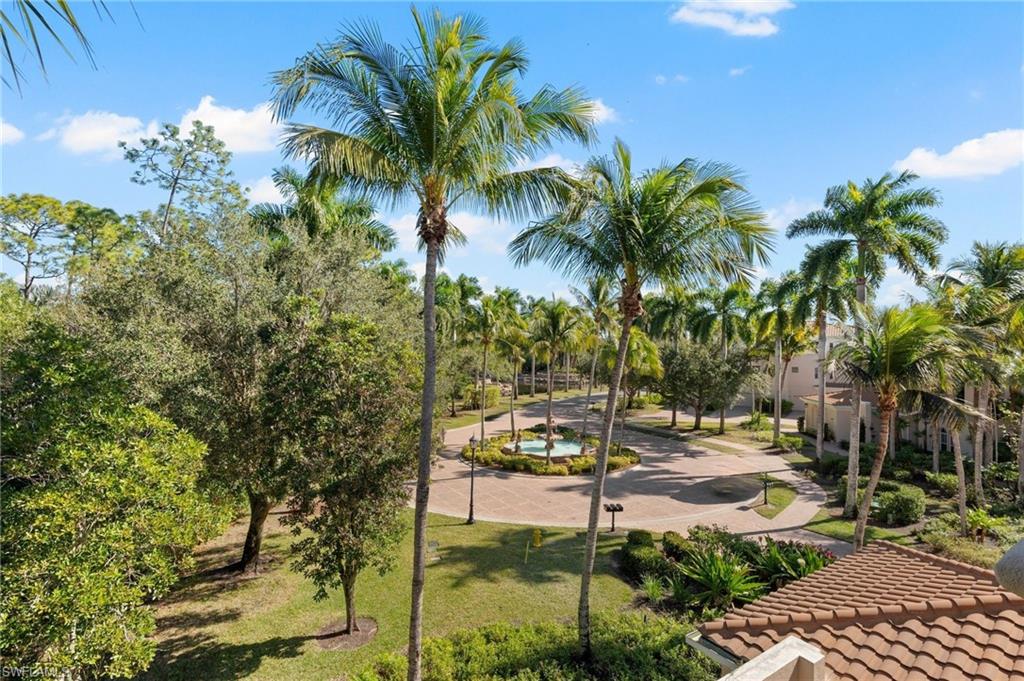 2886 Castillo Court, Unit 103 Naples, FL 34109 - Photo 9 of 38 a view of a backyard of a house