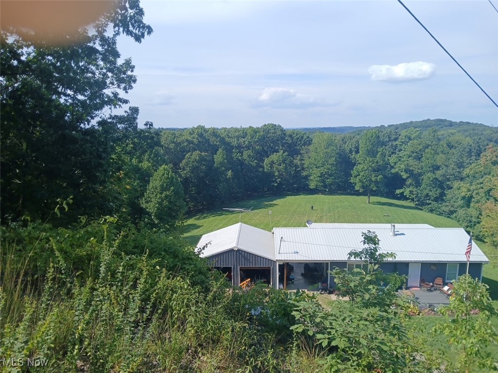 1685 Fattler Ridge Road Philo, OH 43771 - Photo 23 of 24 View from above of property featuring a forest