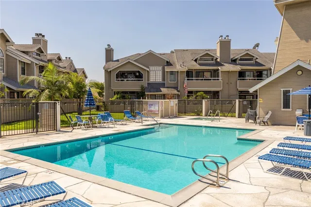 a view of a house with swimming pool