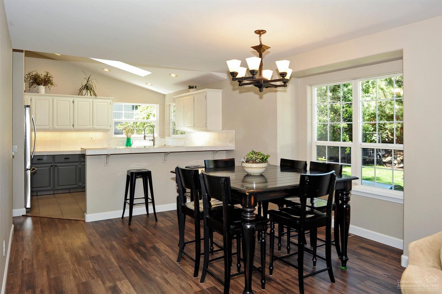 1718 Southeast Virginia Road Bend, OR 97702 - Photo 8 of 21 Kitchen opens to dining room with pictur