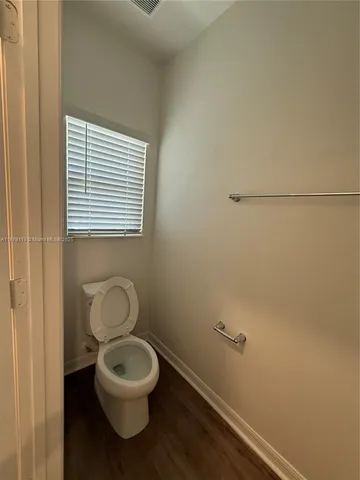 a bathroom with a toilet