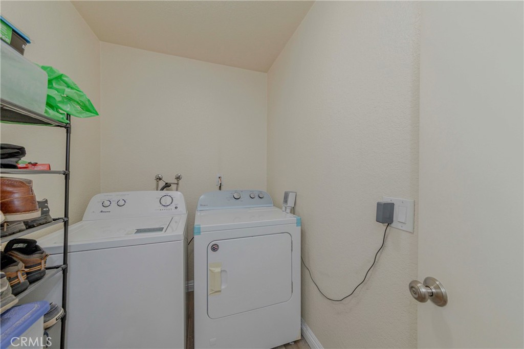 22224 South Vermont Avenue, Unit 102C Torrance, CA 90502 - Photo 15 of 27 a utility room with dryer and washer