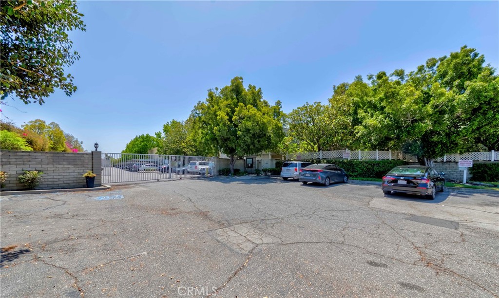 22224 South Vermont Avenue, Unit 102C Torrance, CA 90502 - Photo 2 of 27 a view of street with parked cars